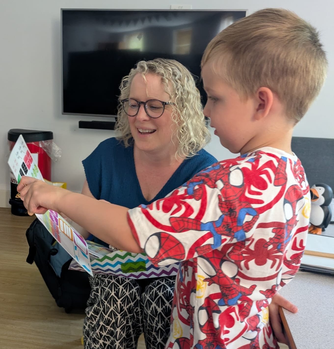 Kate with child during speech sound therapy